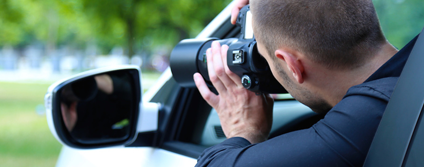 Detective Taking Photographs